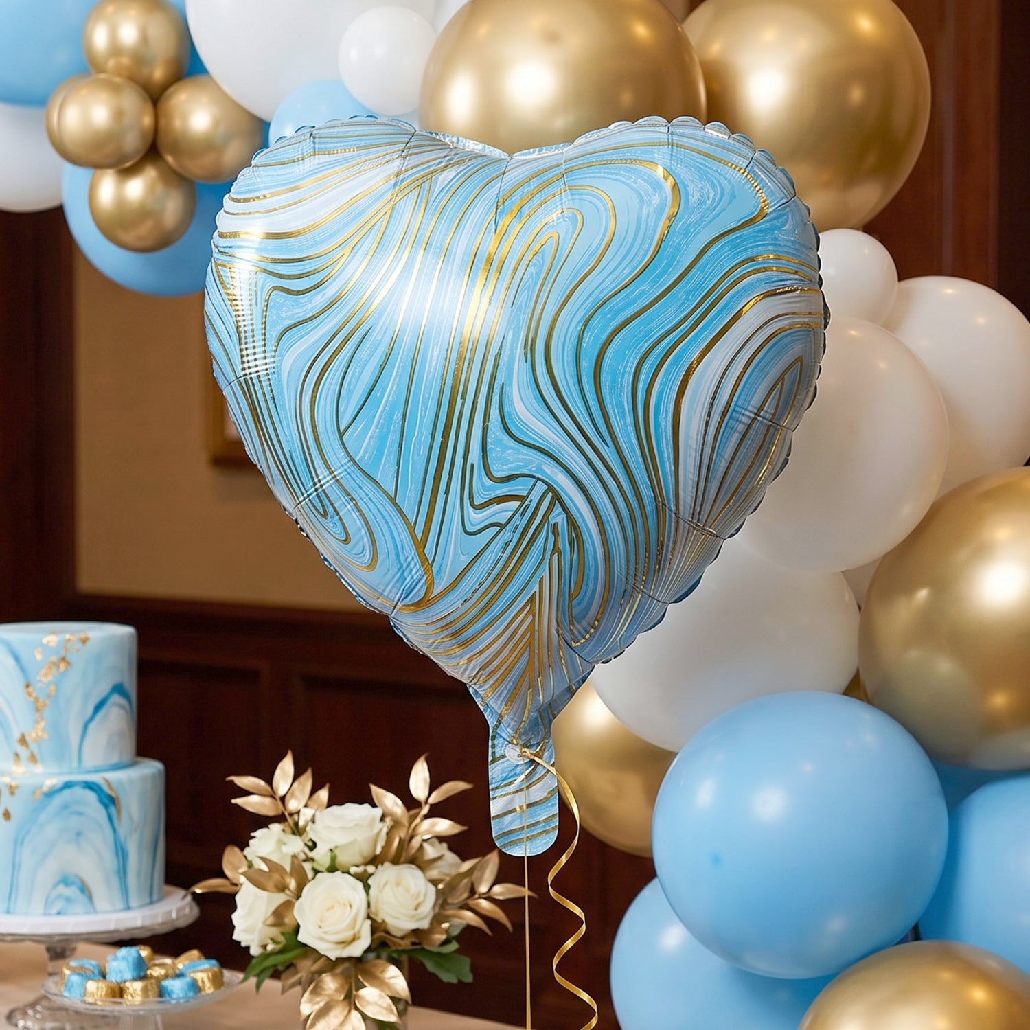 Blue Marble Heart Foil Balloon on party backdrop