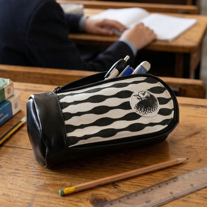 Pencil pouch with zipper closure and hard base