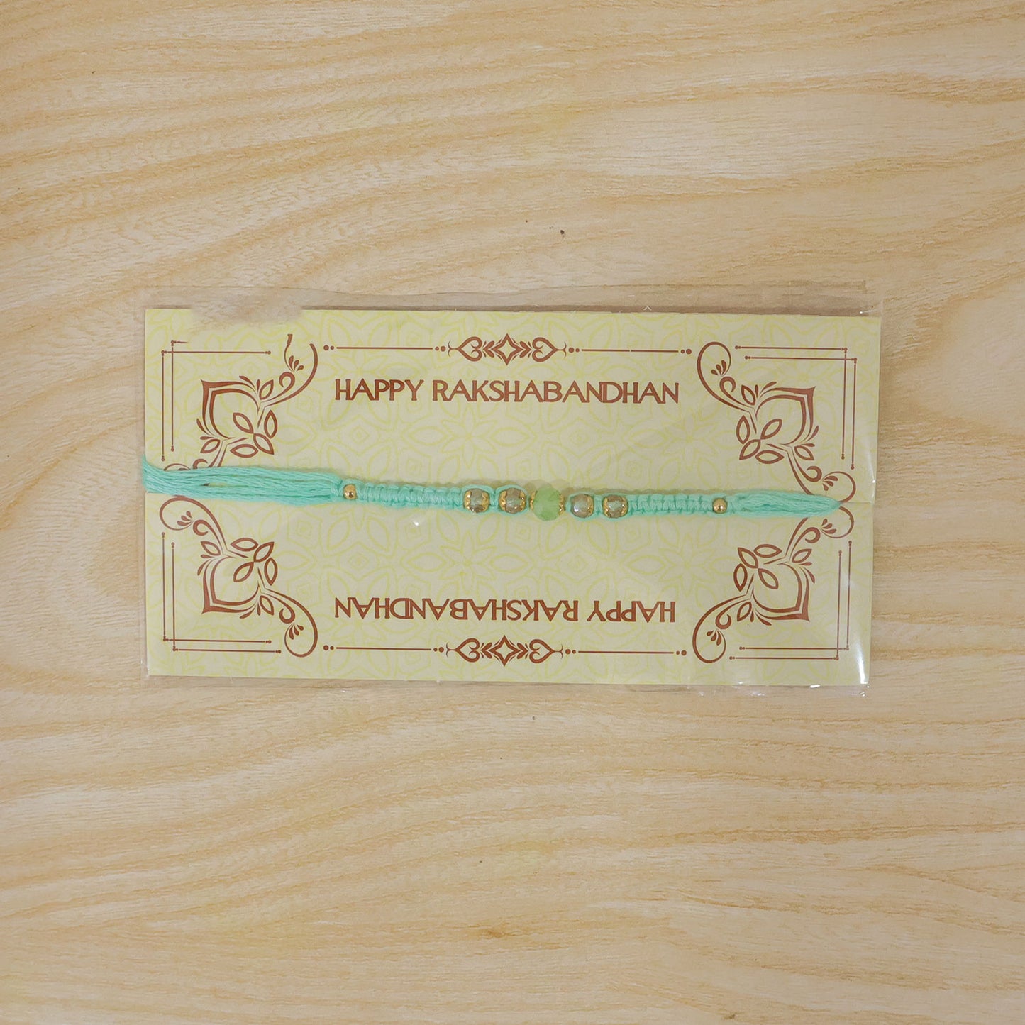 Beautiful Pearl and Stone Rakhi with Bright Beads and Elegant Raksha Bandhan Look
