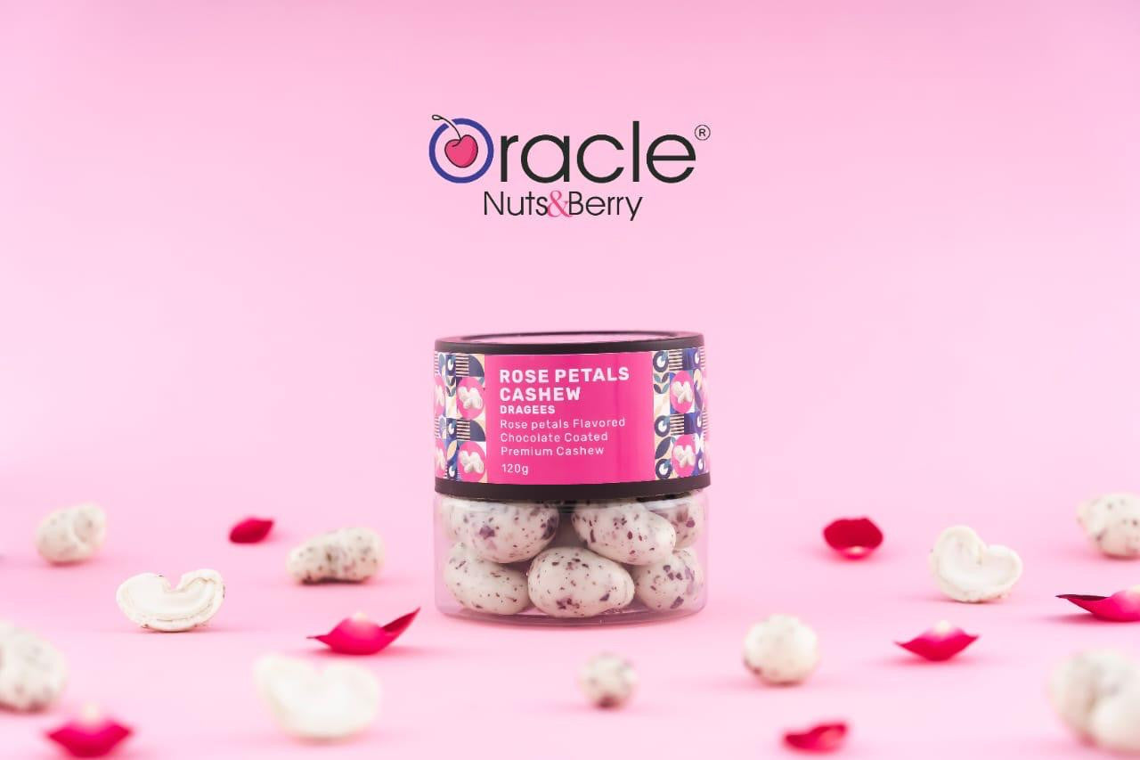 Handful of gourmet cashew bites with subtle rose petals, perfect for gifting.