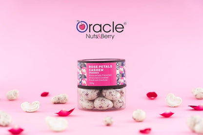 Handful of gourmet cashew bites with subtle rose petals, perfect for gifting.