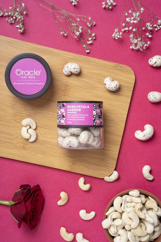 Oracle Rose Petal Cashew Dragees in elegant packaging, highlighting the brand.