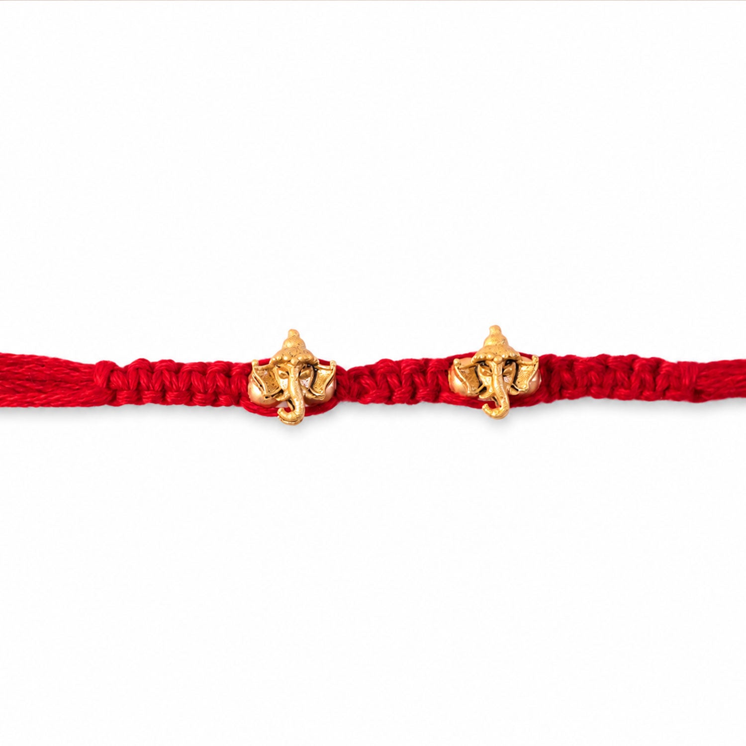 Red Thread Rakhi with Twin Antique Gold Ganesha Shaped Charms