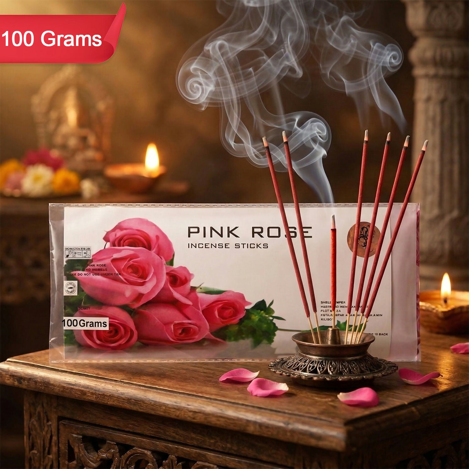 Pink Rose incense sticks laid on a wooden surface