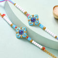 Om Printed Clover Crystal Studded Pearl Beads Bhai Bhabhi Rakhi Set