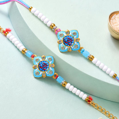 Om Printed Clover Crystal Studded Pearl Beads Bhai Bhabhi Rakhi Set