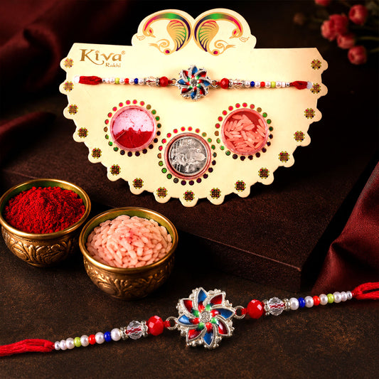 Multicolor Floral Chakra Rakhi with Pearl Beads, Roli Chawal Coin and Peacock Card Packing