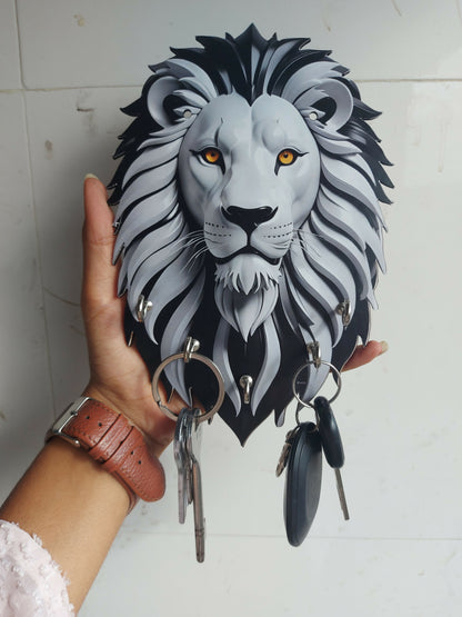 Detailed view of the wooden craftsmanship of the lion key holder