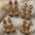 Antique Temple Gold Jhumka Earrings – Intricate Floral Design, Festive Wear