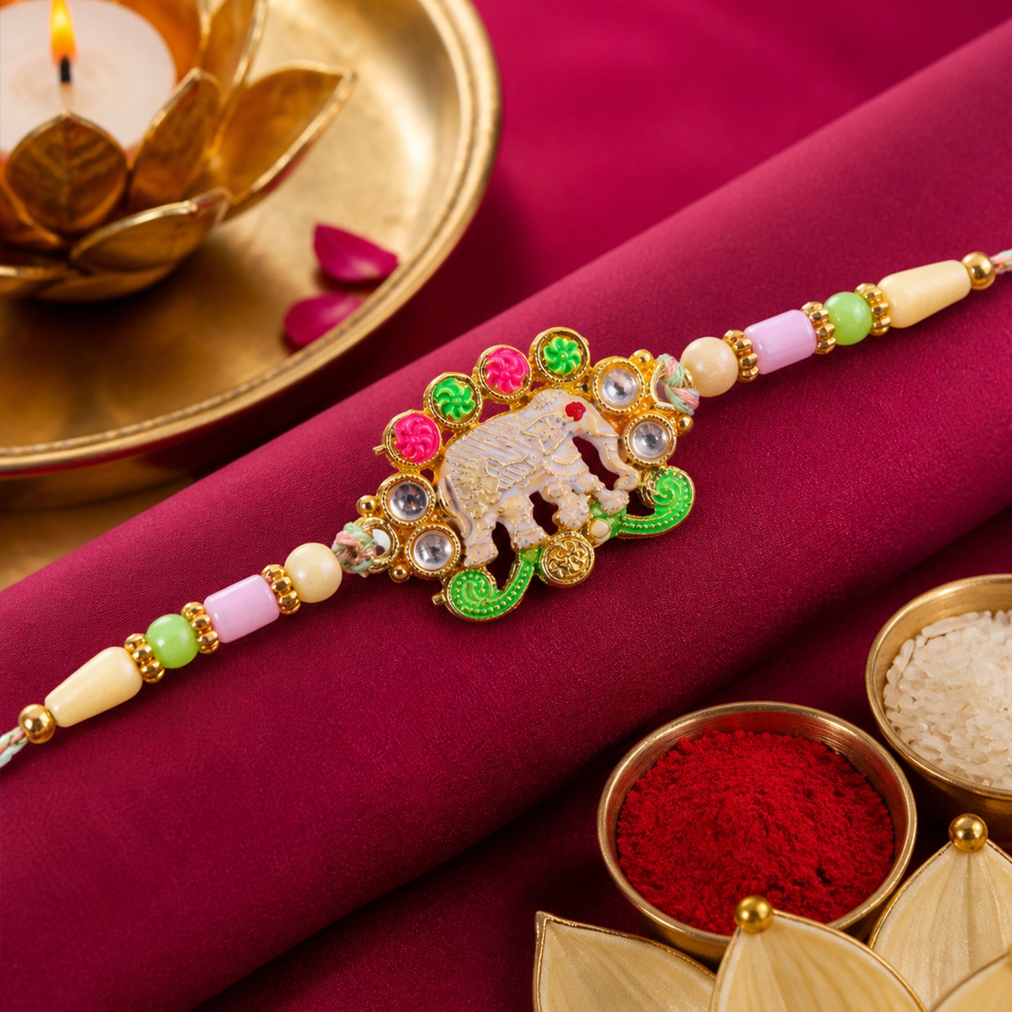 Festive Rakhi showcasing Elephant Charm, gold trims and display look for Gift Use