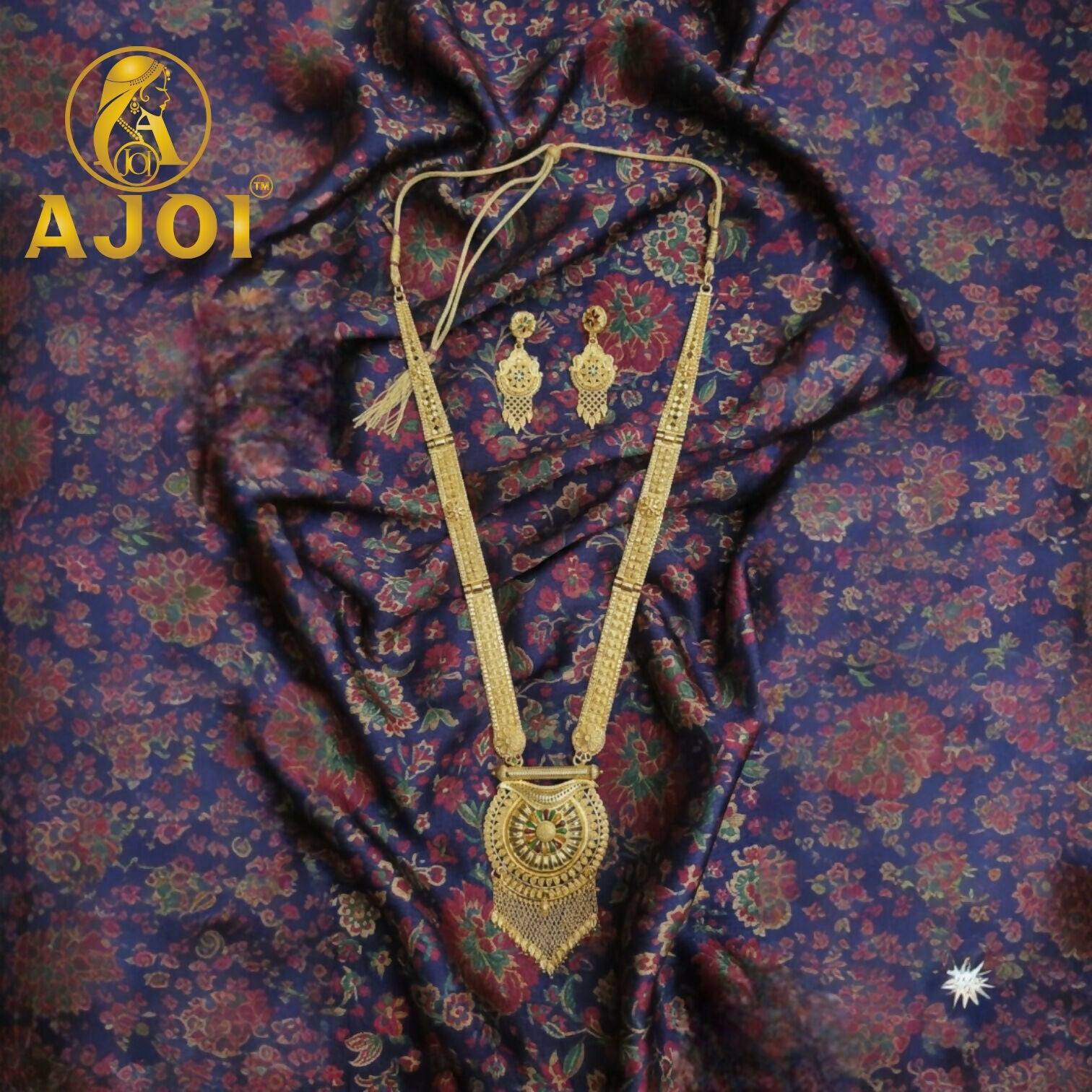 Royal Bloom Radiance long necklace set showcasing warm golden floral motifs