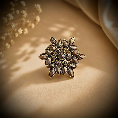 Model showcasing the elegant Vintage Floral Statement Ring on her hand.