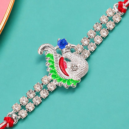 Festive Rakhi with Peacock Charm, pink accents and display look for Gift Styling
