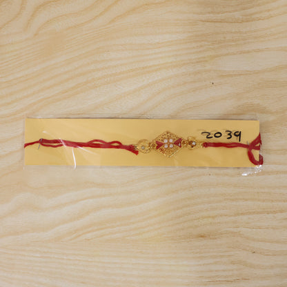 Royal Red Kundan Rakhi with Pearl Cluster and Gold Side Charms