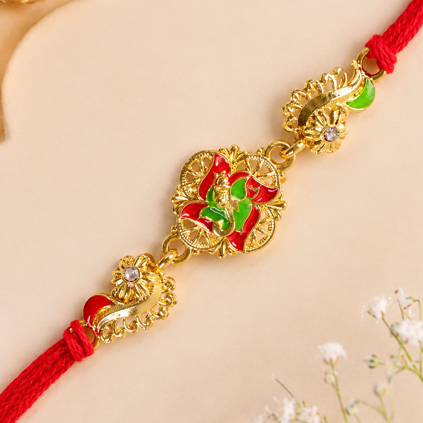 Ornate Rakhi featuring Floral Medallion, multicolor stones and gift style for Gift