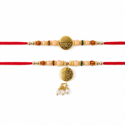 Couple Rakhi with Gold Coin Charm, Pearl Drop and Multicolor Bead Accents