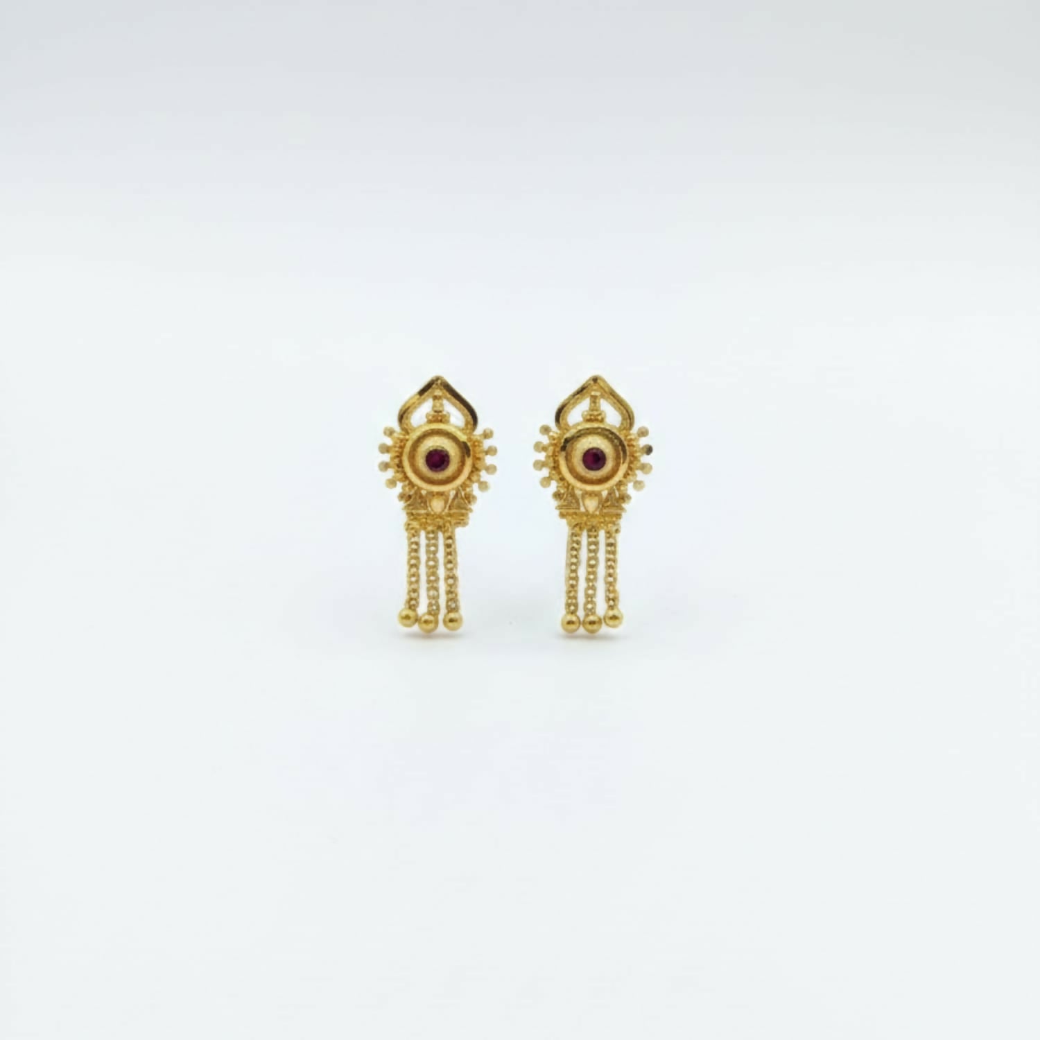 Ornate circular stud on gold plated jhumka earrings with colorful enamel highlights