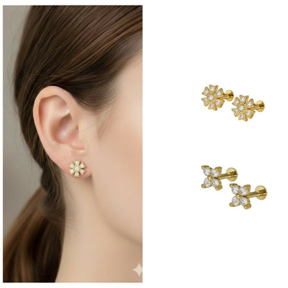Close-up of floral gold flat back stud earrings showcasing floral design and stones