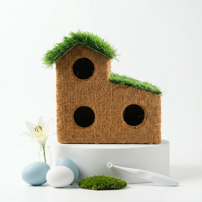 Close-up of triple entry holes on coconut coir bird house