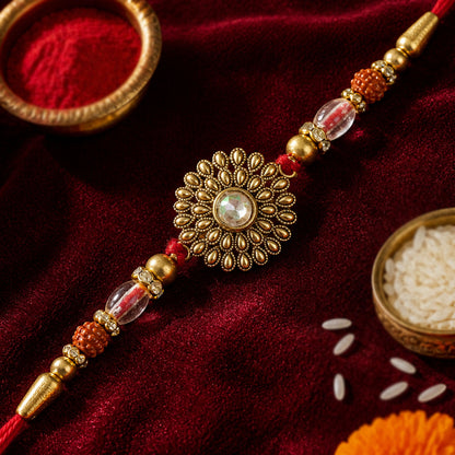 Oxidized Gold Floral Sunburst Pendant Rakhi with Rudraksha and Pearl Beads