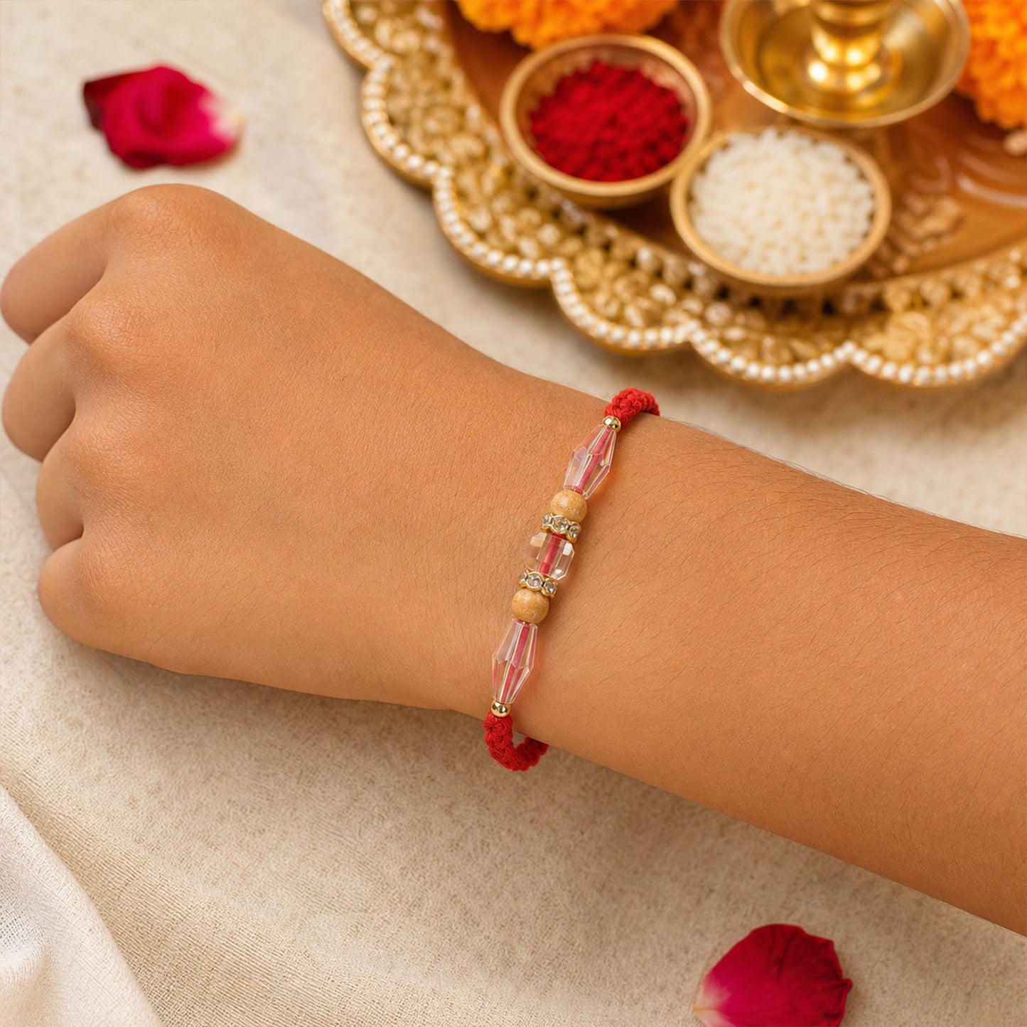 Red Thread Rakhi with Champagne Crystal Beads and Wooden Bead Accents