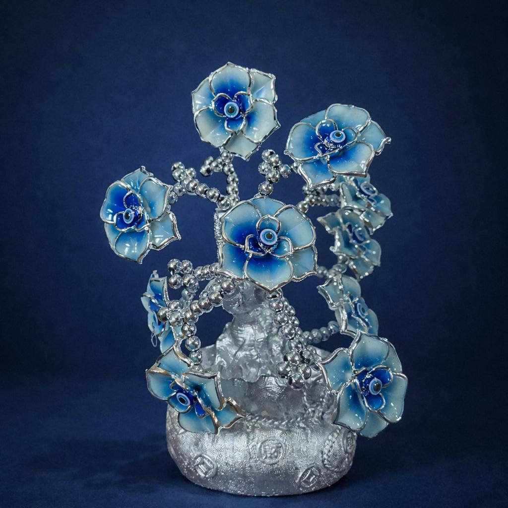 Decorative silver lucky tree statue with intricately crafted vase base and floral details