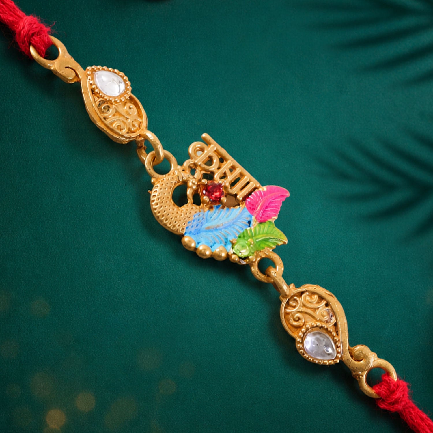 Designer Rakhi with Decorative Floral Medallion, gold trims and chain look for Gift