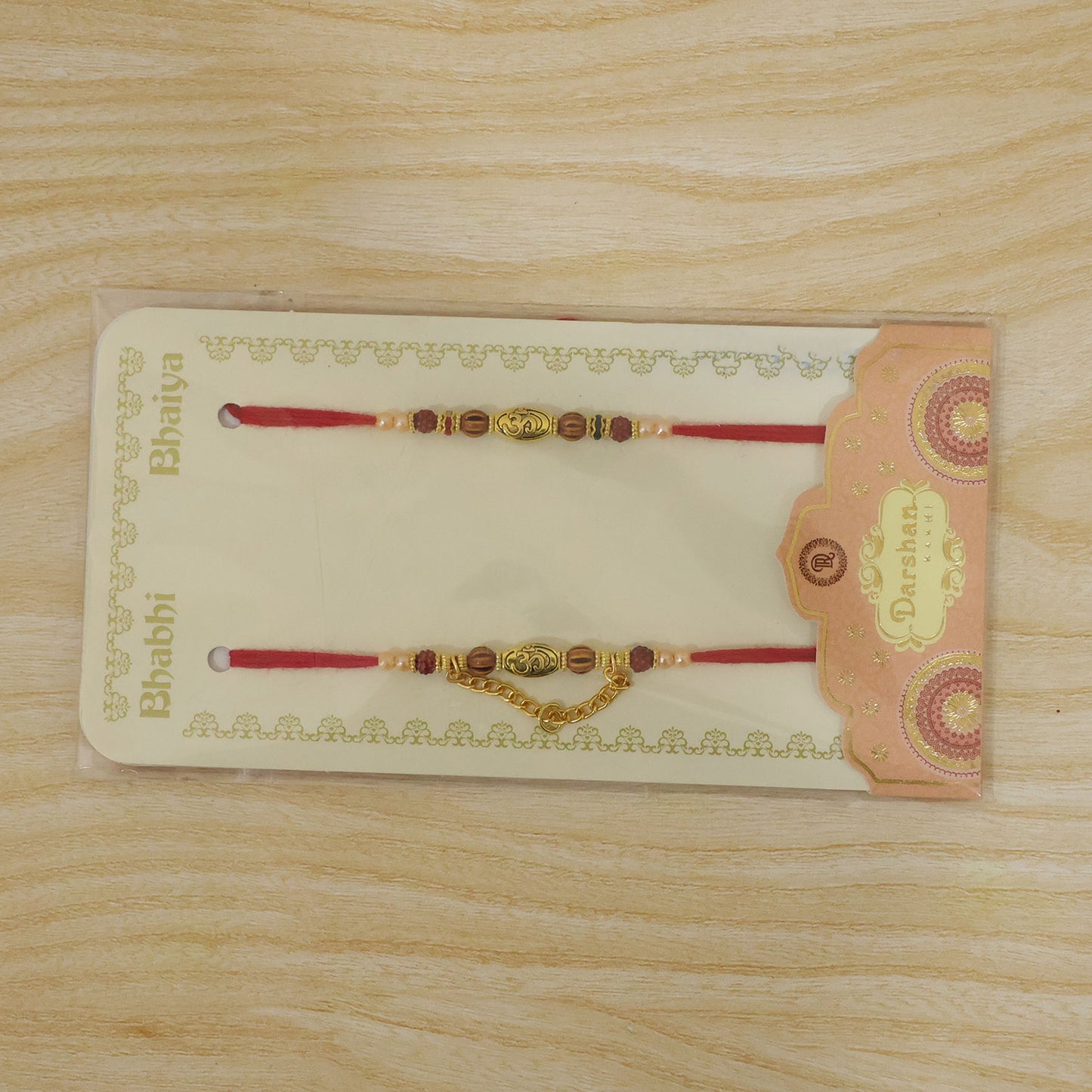 Om Design Couple Rakhi Set with Rudraksha Pearl Beads and Red Thread for Bhai Bhabhi