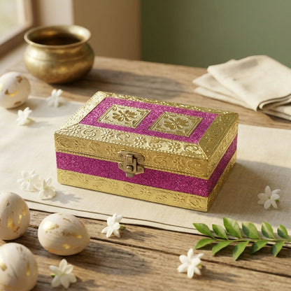 Side view of magenta glitter box with golden embossing and secure latch