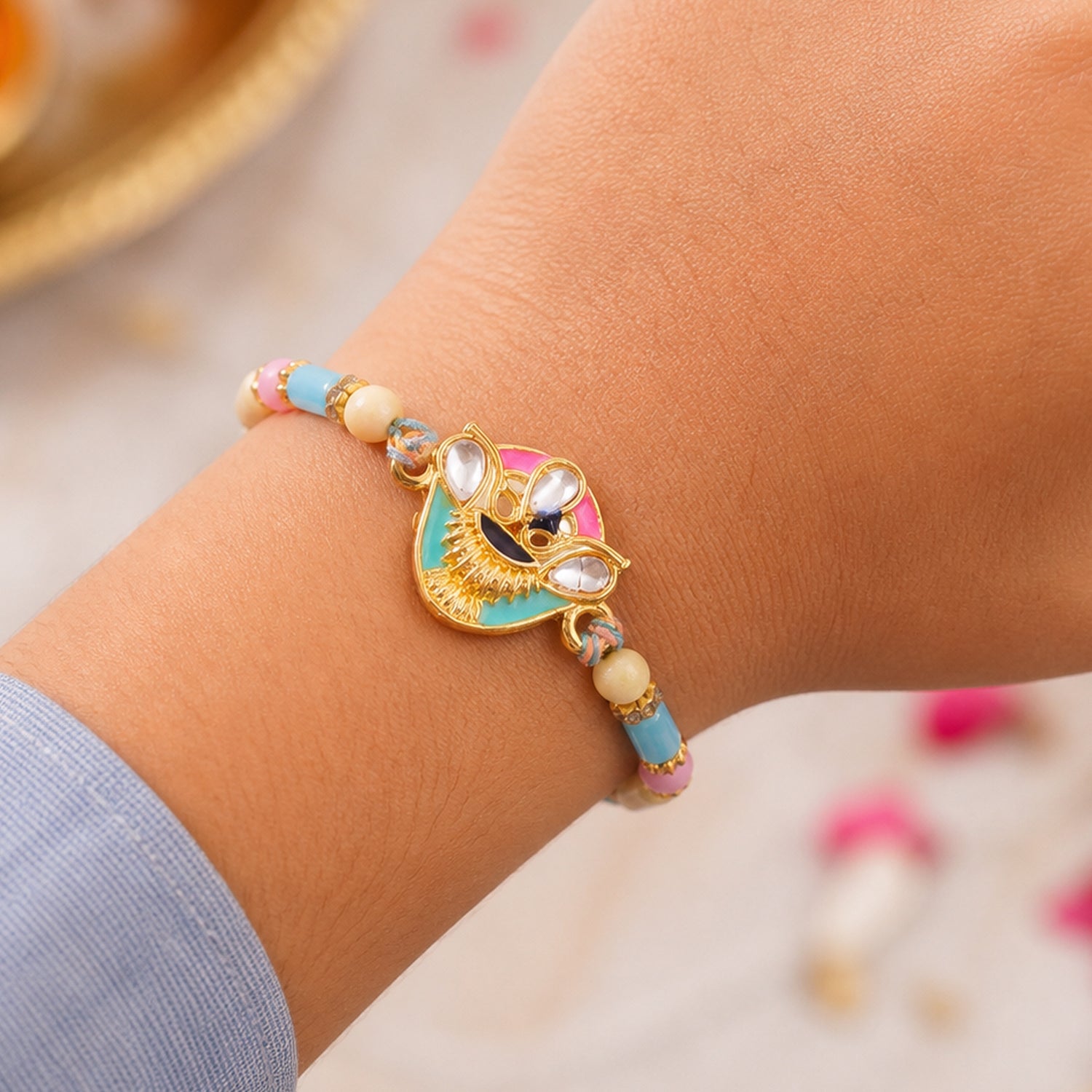 Crown Shaped Kundan Pendant Rakhi with Pink and Teal Enamel
