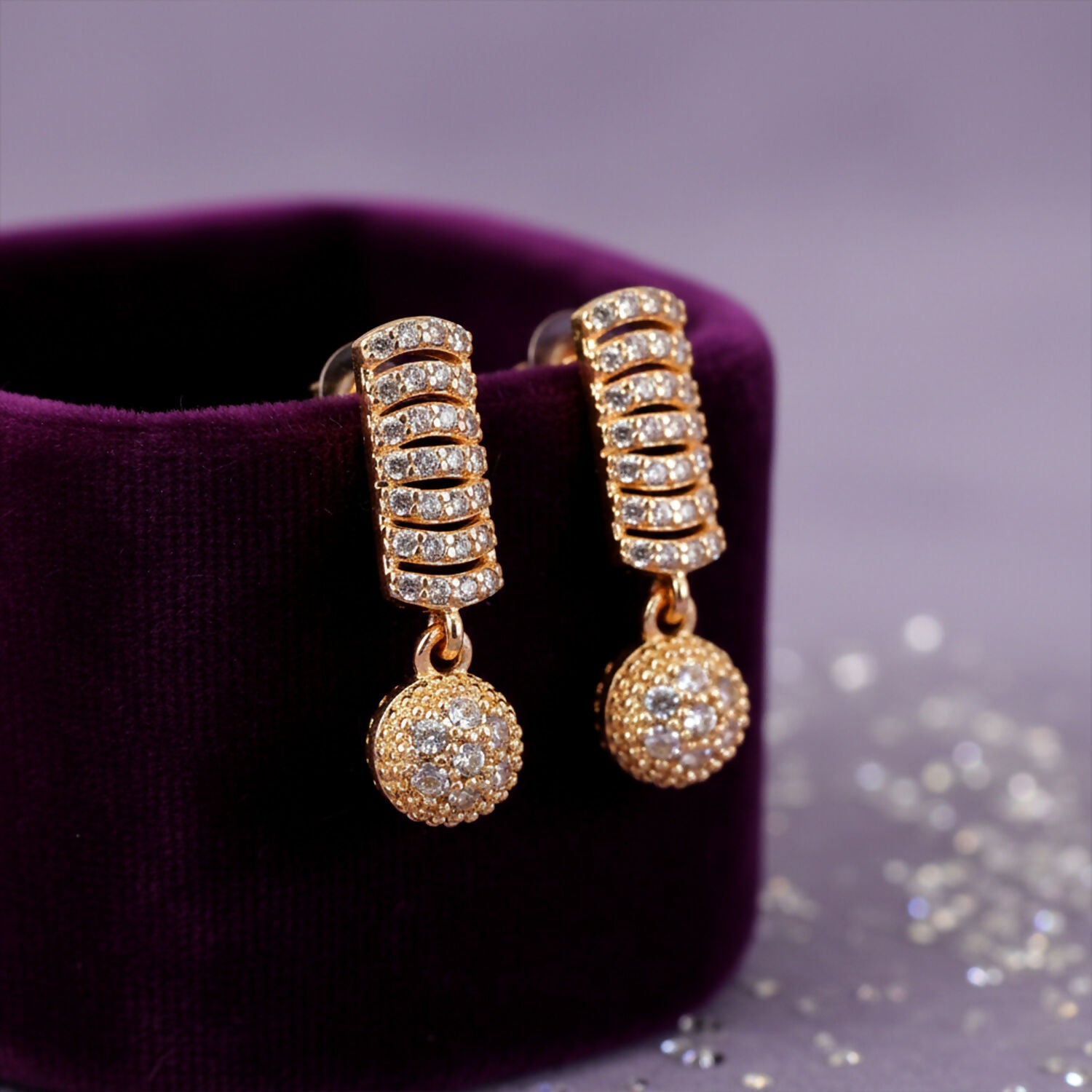Side angle of lightweight CZ stone studded drop earrings for women