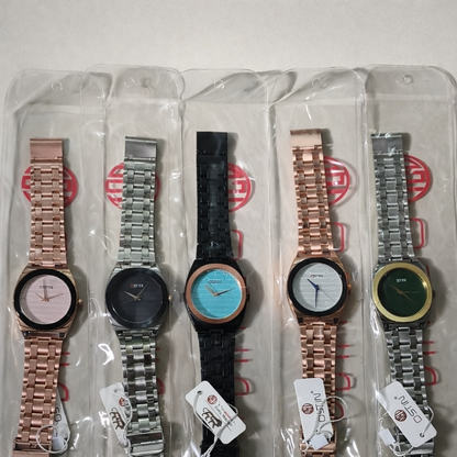 Side view of men's stylish rose gold wrist watch with adjustable metal strap