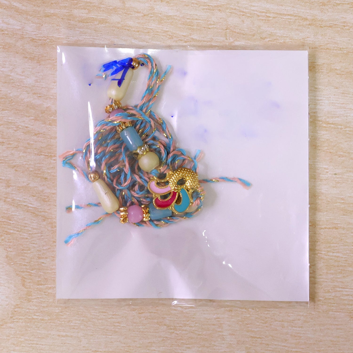 Colorful Enamel Bird Pendant Rakhi with Pastel Beads
