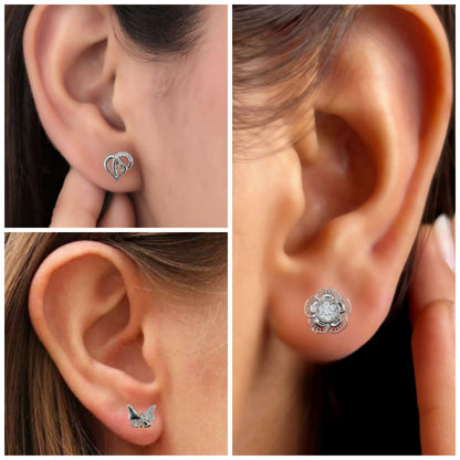 Close-up of silver flower zircon stud earrings showing detailed design and sparkle