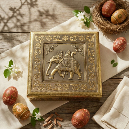 Side view of golden elephant Ambari jewelry box with embossed design