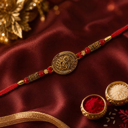 Om Coin Stone Rakhi with Red Beads and Blue Velvet Look