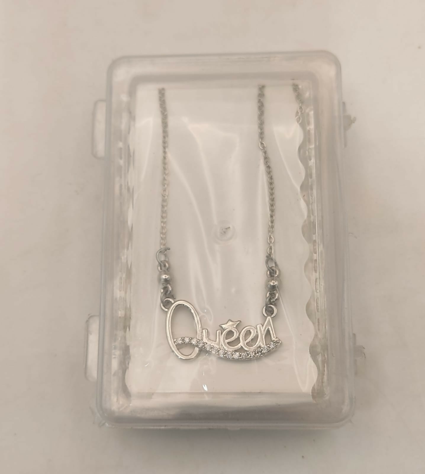 Queen pendant necklace in silver rhodium finish with lustrous Cubic Zirconia stones