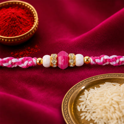 Pink-White Braided Rakhi with Rose-Pink Stone Bead Pendant