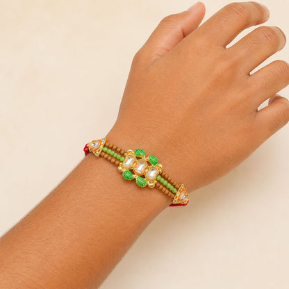 Traditional Triple Kundan & Green Leaf Motif Rakhi with Wooden & Green Beaded Strand