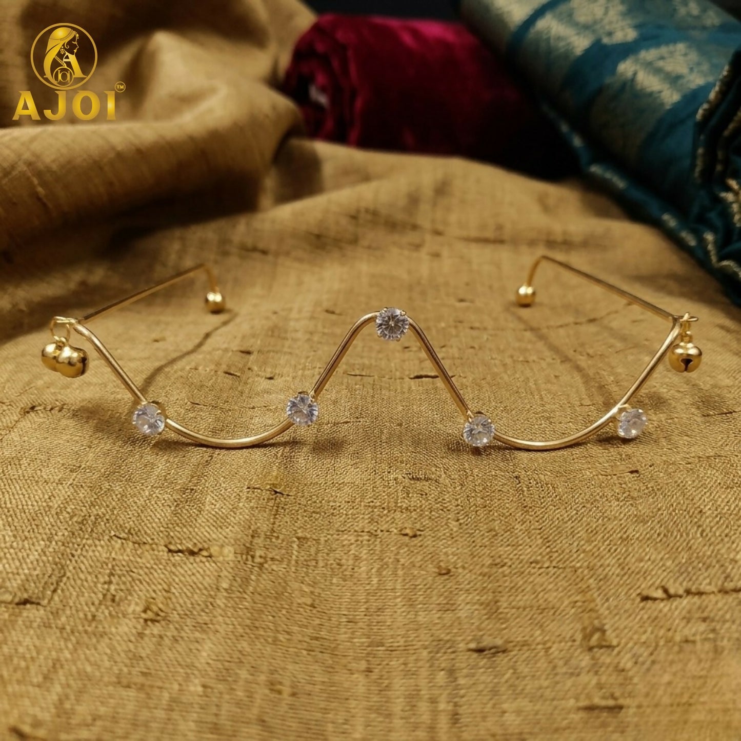 Geometric zigzag crystal goggles in gold plated finish