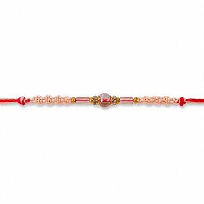 Sparkling Pearl Stone Rakhi with Colorful Thread and Premium Festive Beauty
