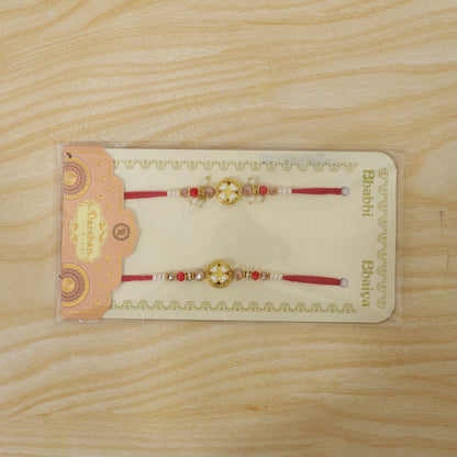 White Heart Floral Couple Rakhi Set with Crystal Beads and Pearl Lumba Charm Design