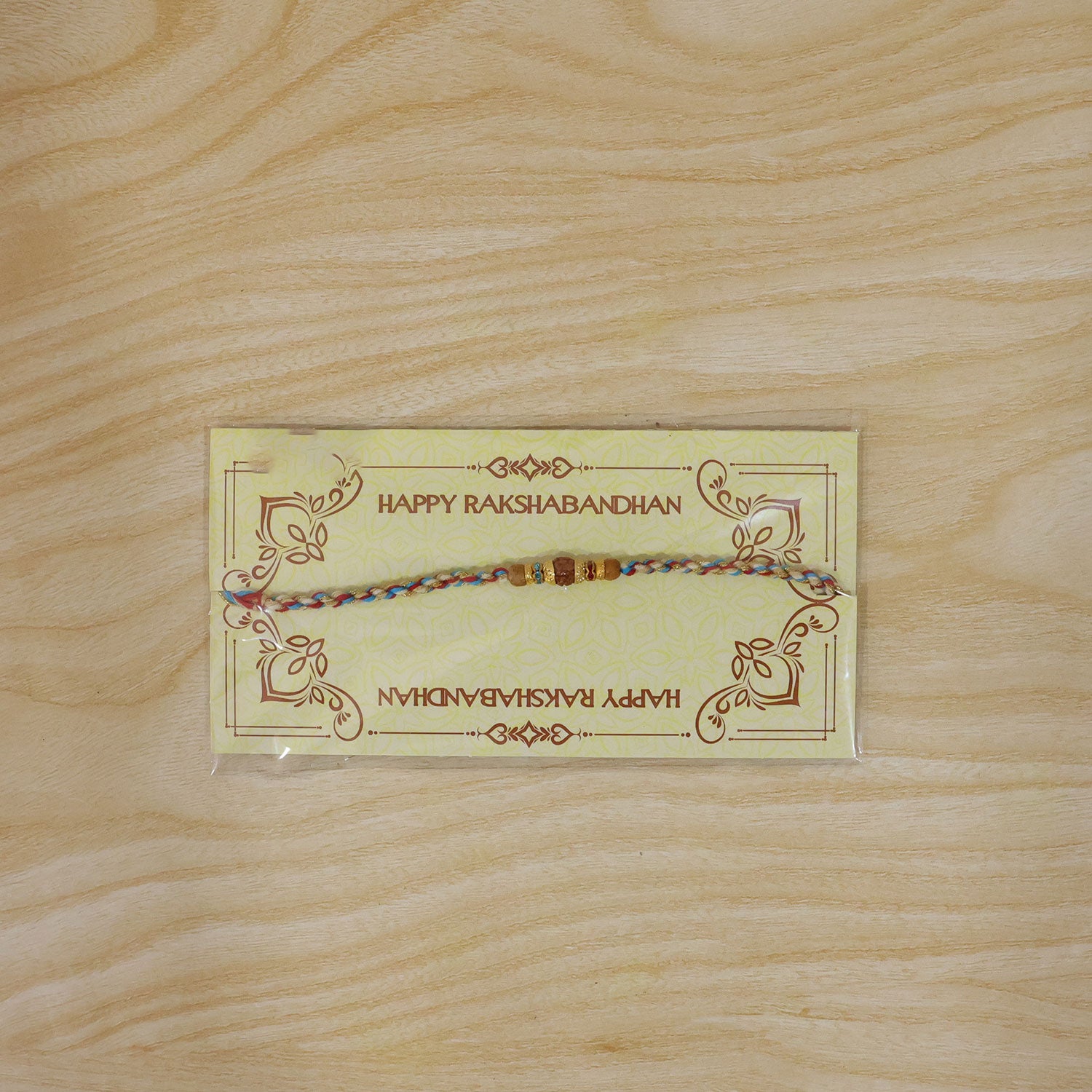 Graceful Pastel Pearl Rakhi with Fine Beads and Premium Raksha Bandhan Charm