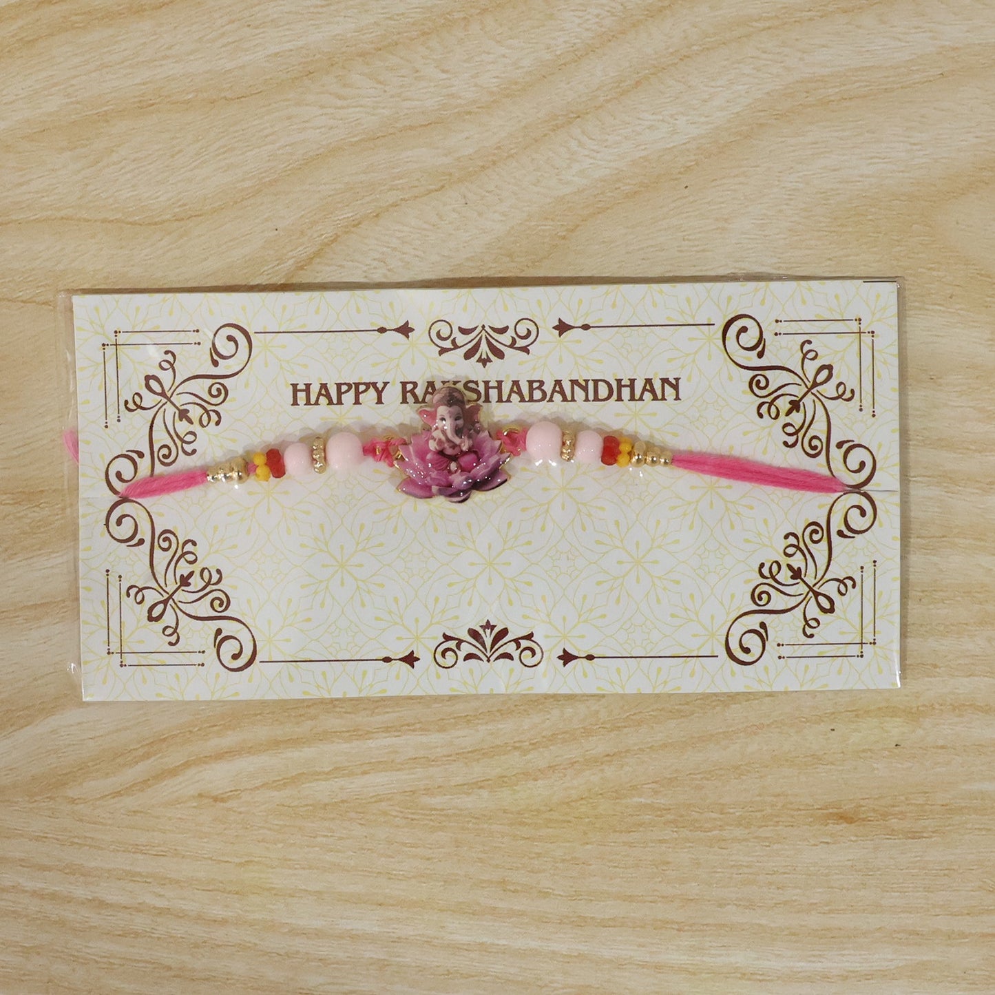Lord Ganesha on Pink Lotus Designer Rakhi