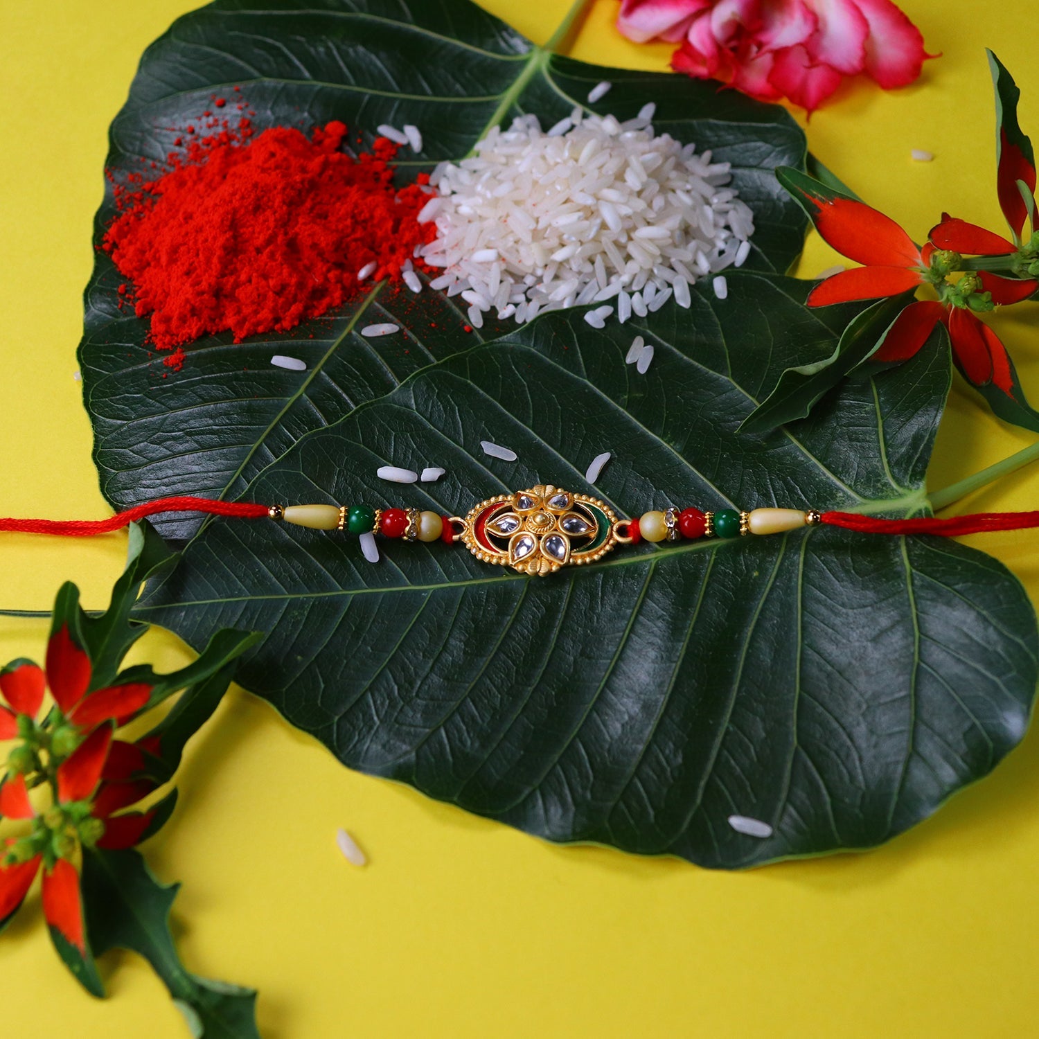 Flower Design Rakhi with Red and Green Beads Festive Elegance (5pcs)
