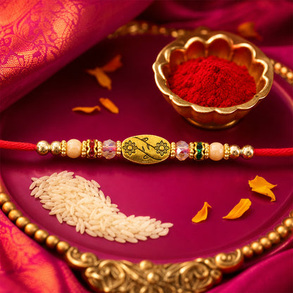 Red Thread Rakhi with Multicolour Beads and Gold Oval Floral Charm