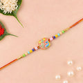 Rakhi – Colorful Peacock Design with Decorative Beads for Raksha Bandhan