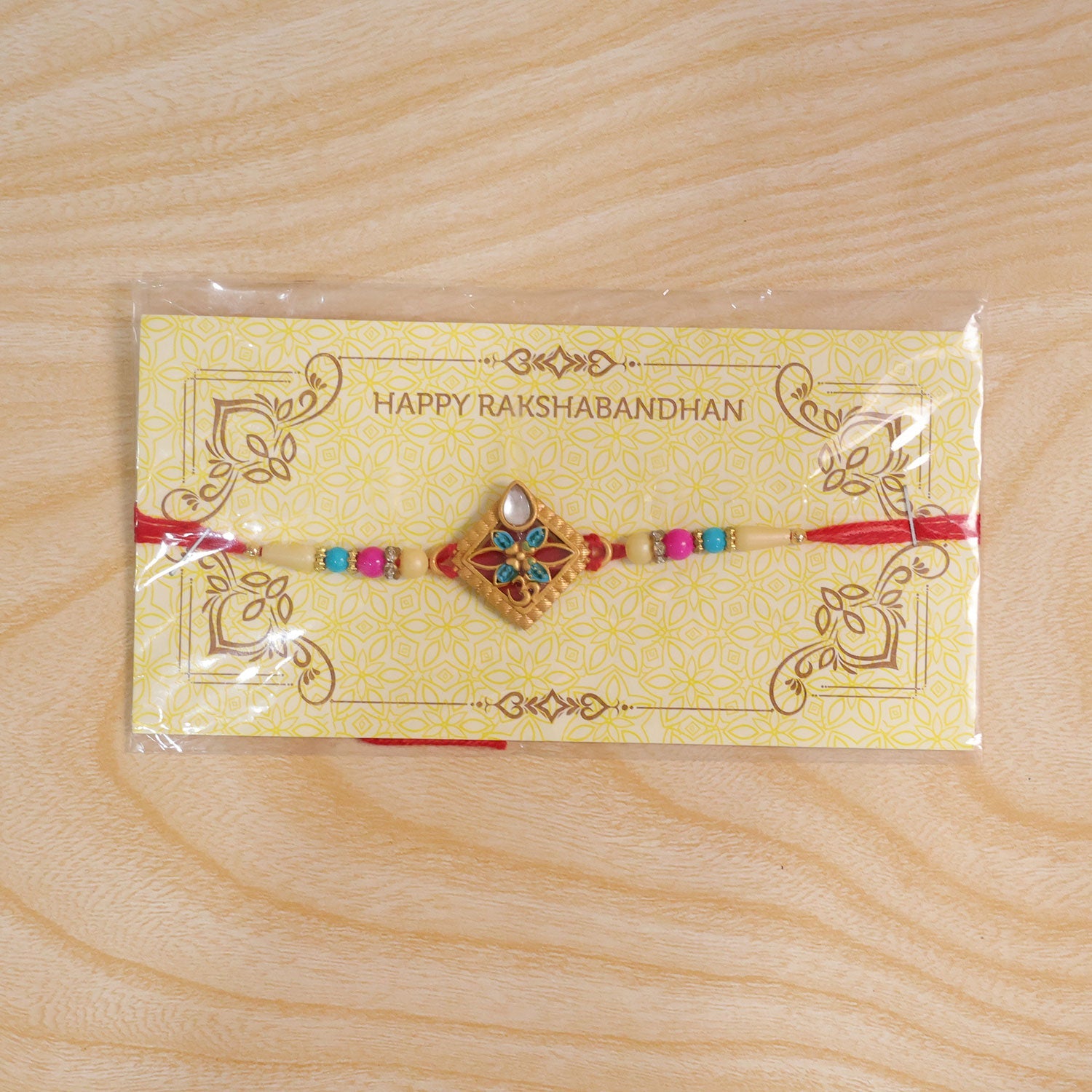Diamond Shape Rakhi with Stone Embellishments and Beads (10pcs)
