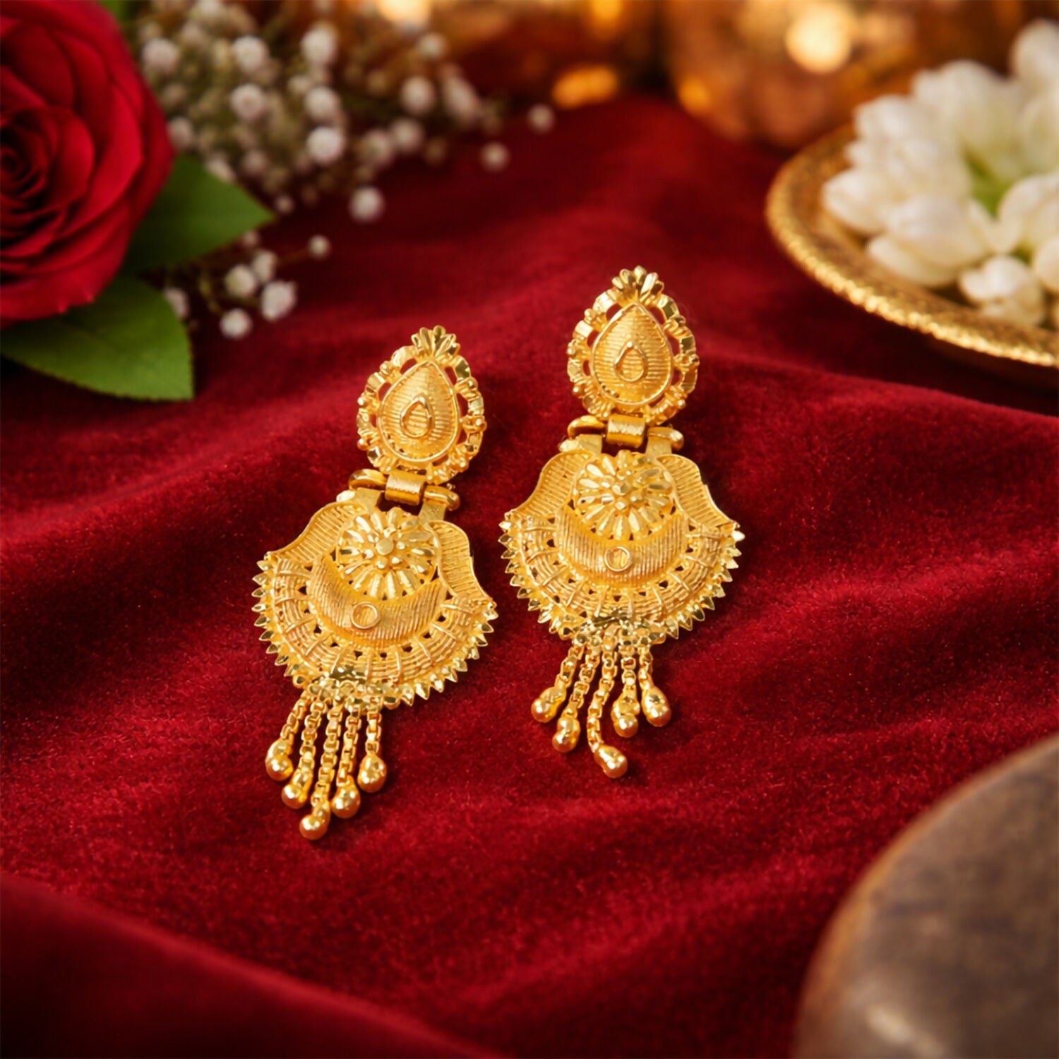 Handcrafted South Indian Heritage Gold Earrings with Intricate Leaf Motif and Classic Jhumka Dangles