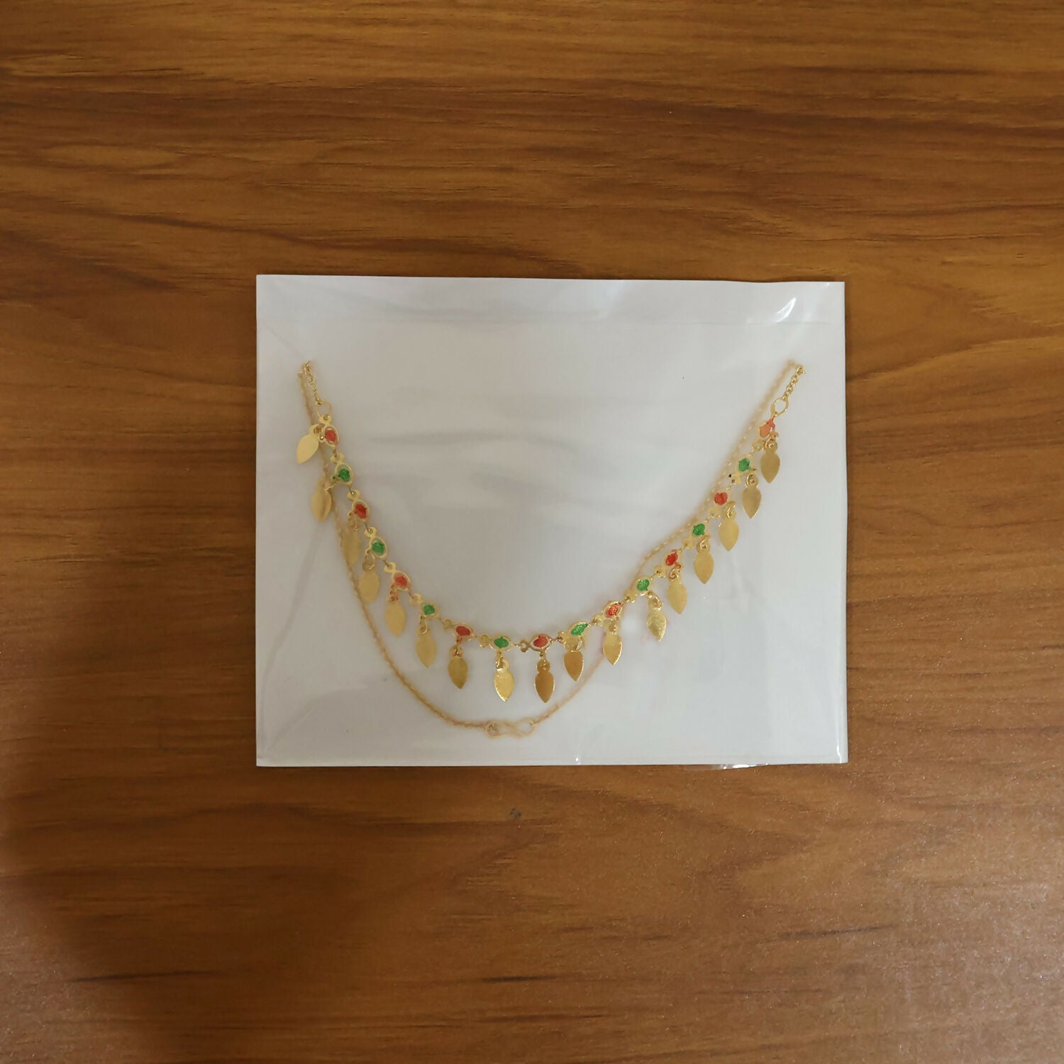 Gold Tone Leaf Charm Necklace with Multicolor Stones